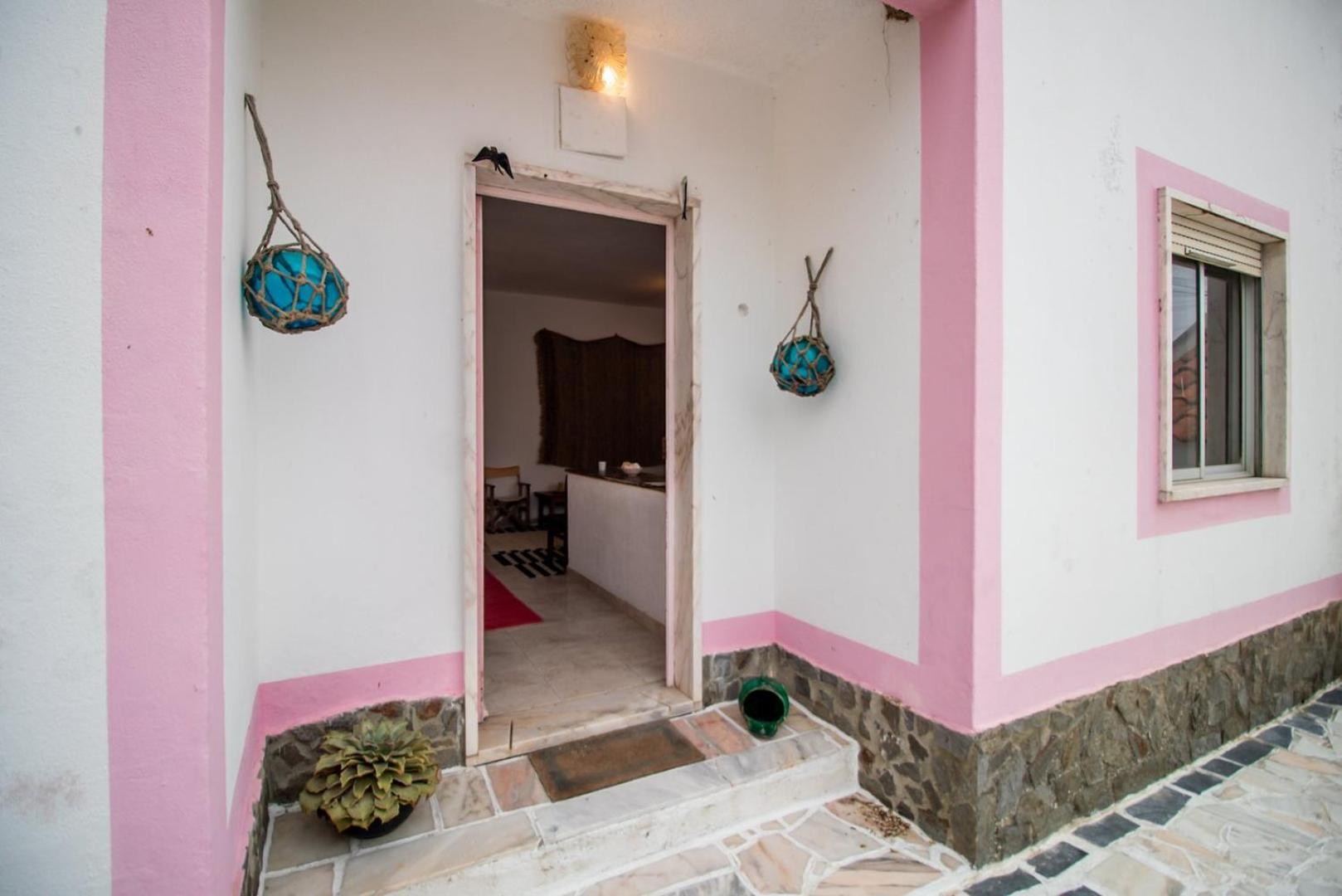 Pink Fisherman's Cabin on Fonte da Telha Beach | By Airnest view 3
