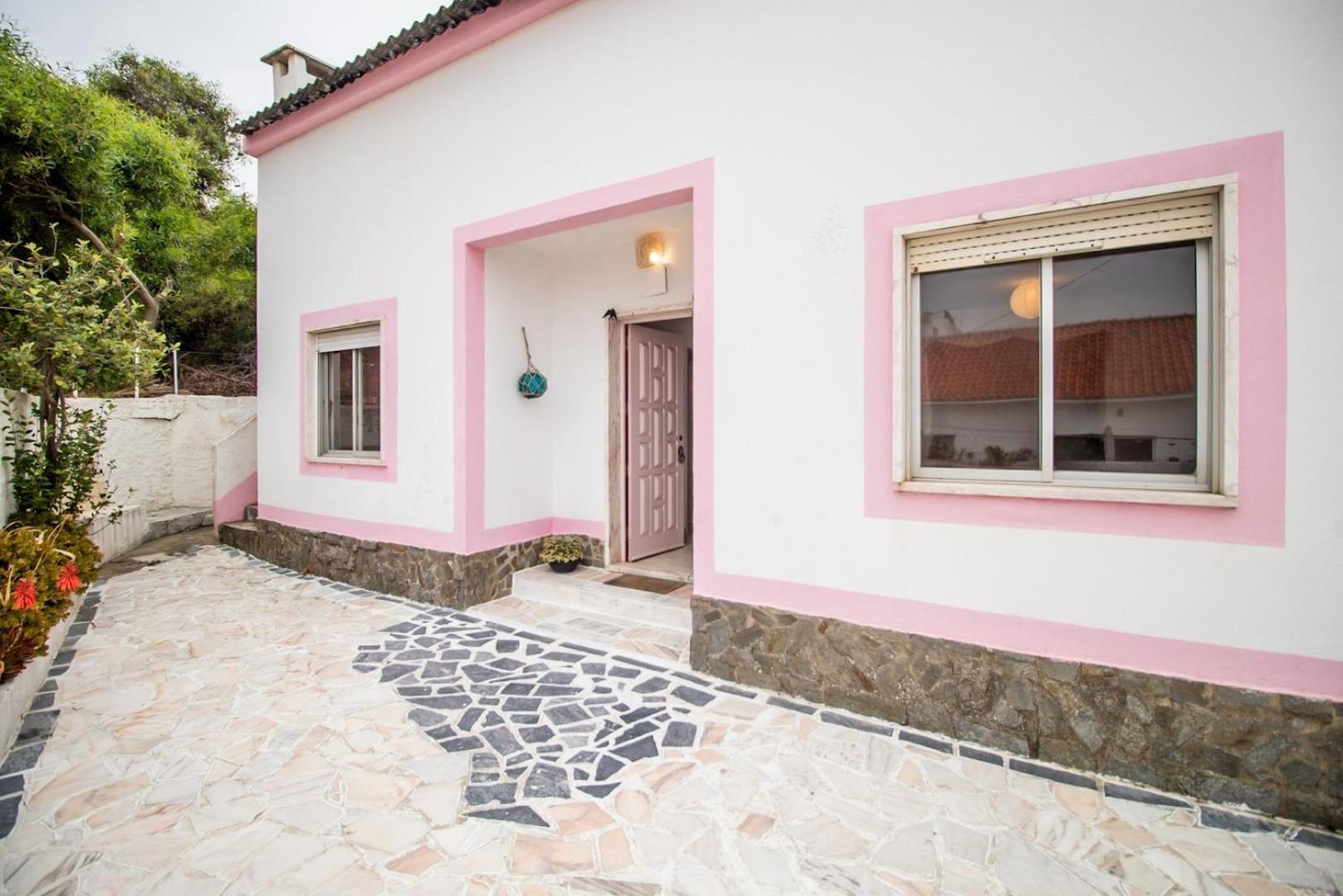 Pink Fisherman's Cabin on Fonte da Telha Beach | By Airnest view 5