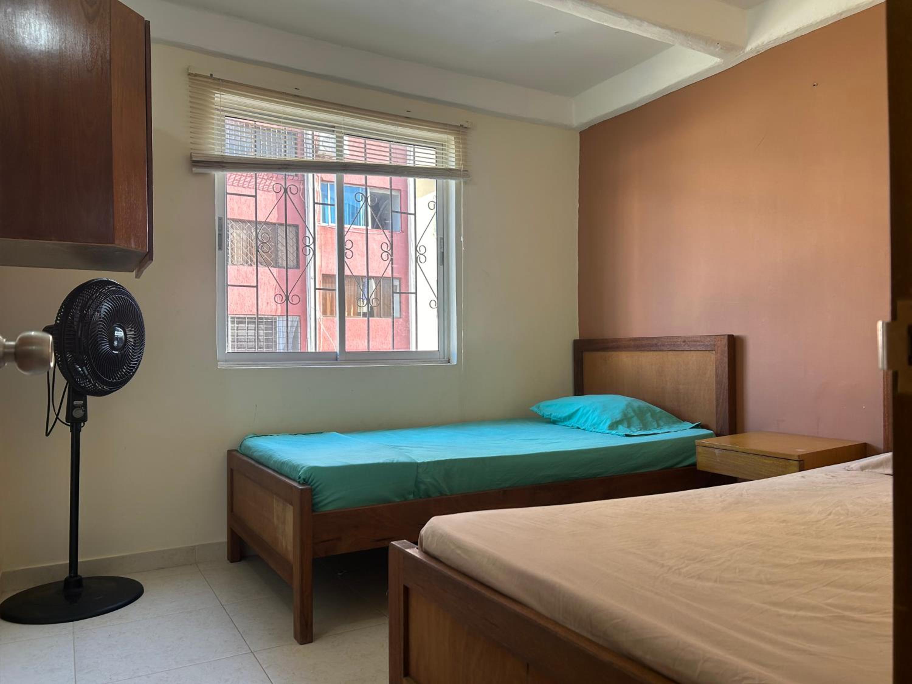 Coastal Twin Oasis Features two single beds and a shared bathroom