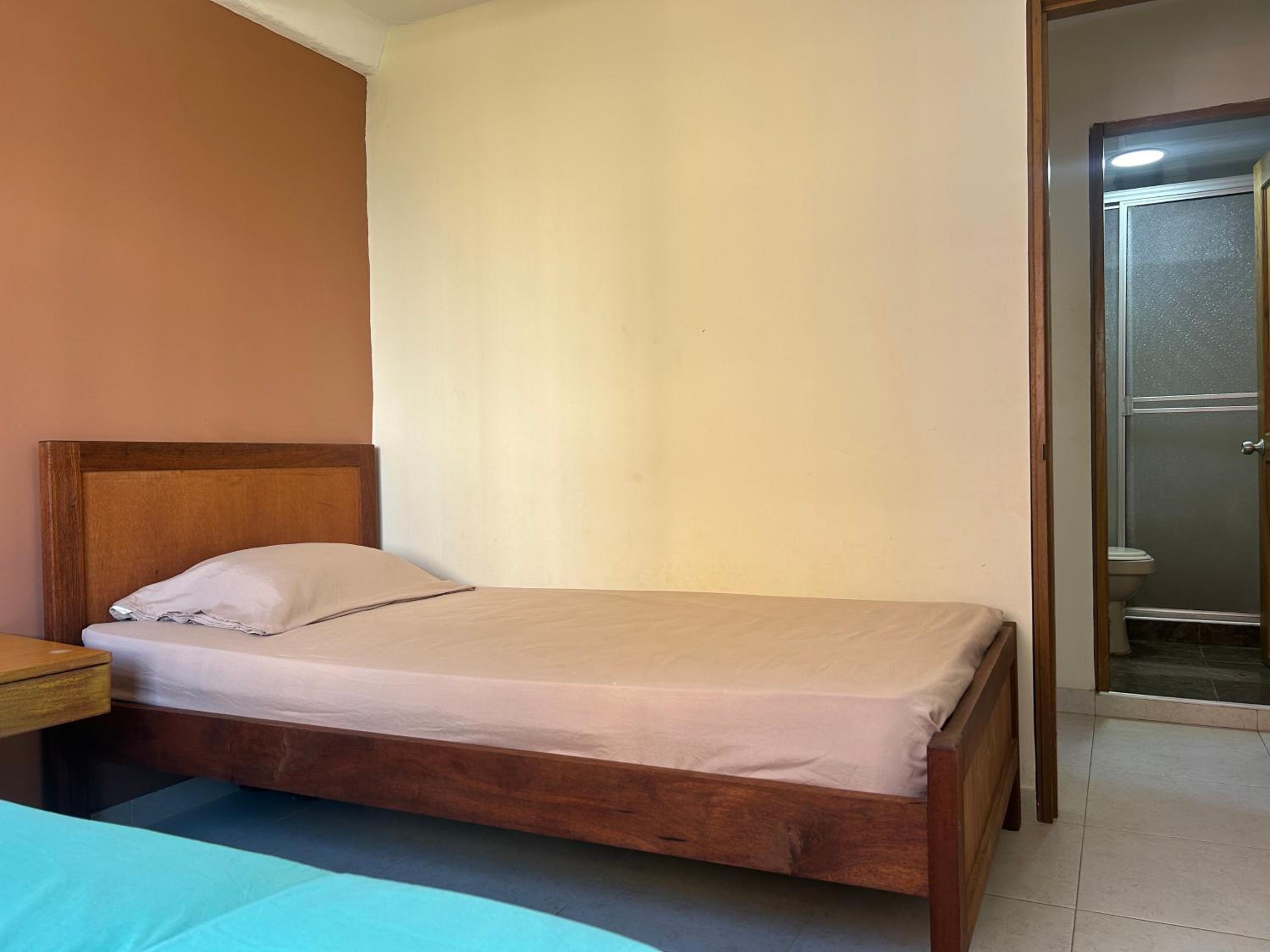 Coastal Twin Oasis Features two single beds and a shared bathroom