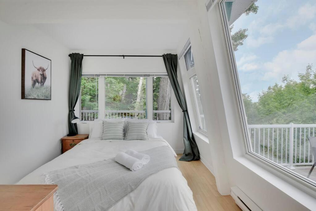 Cottage with water view and hot tub - Le pin blanc