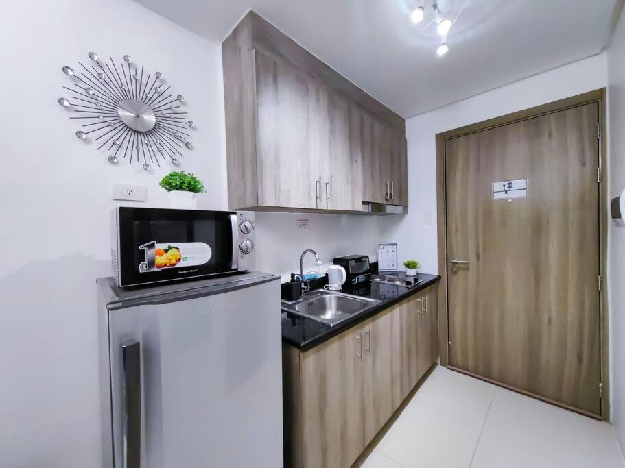 1BR Condotel with Balcony at FAME Residences #FM01 view 4