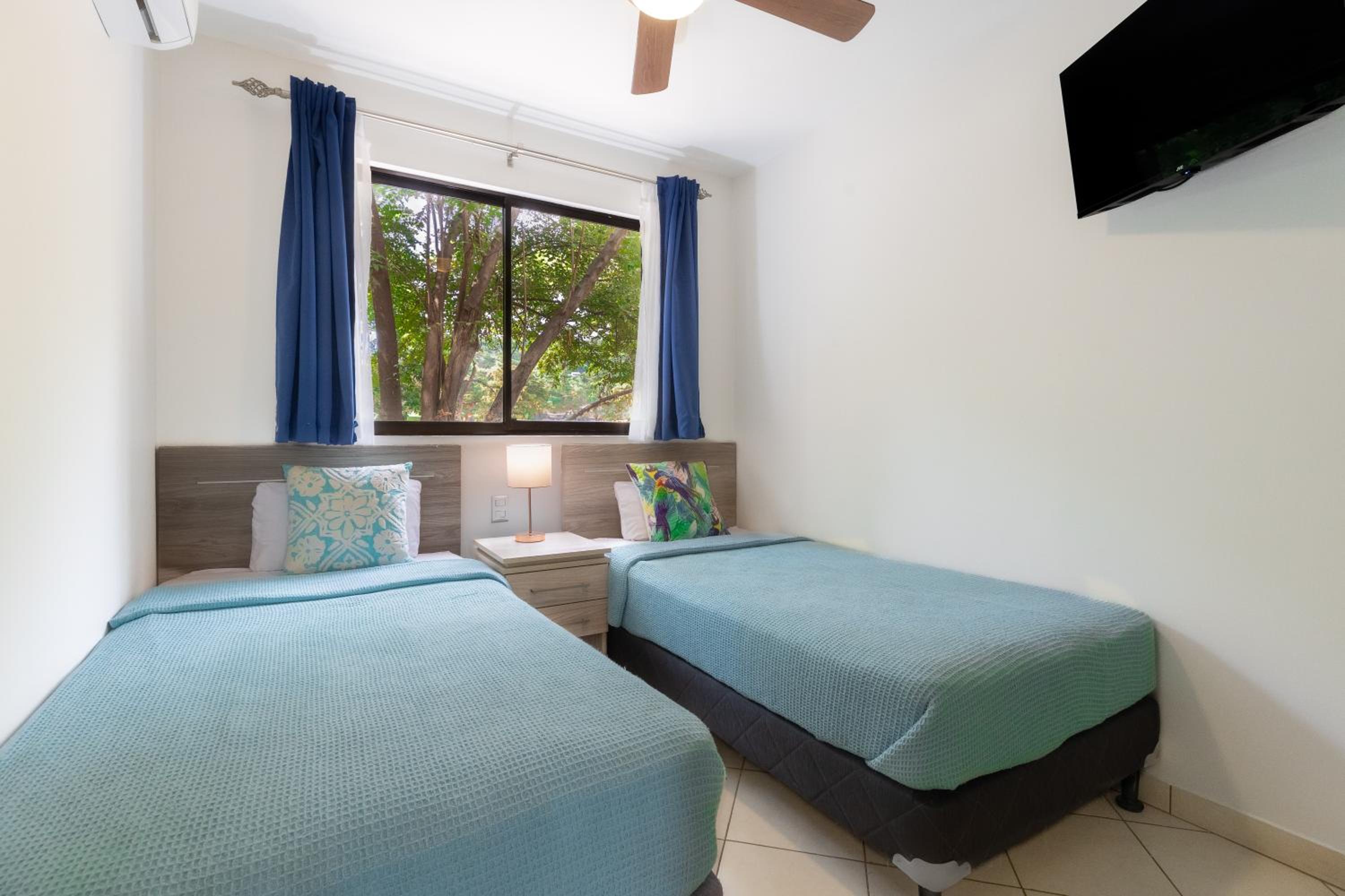 Two Palms Ground Floor Unit Across from Beach