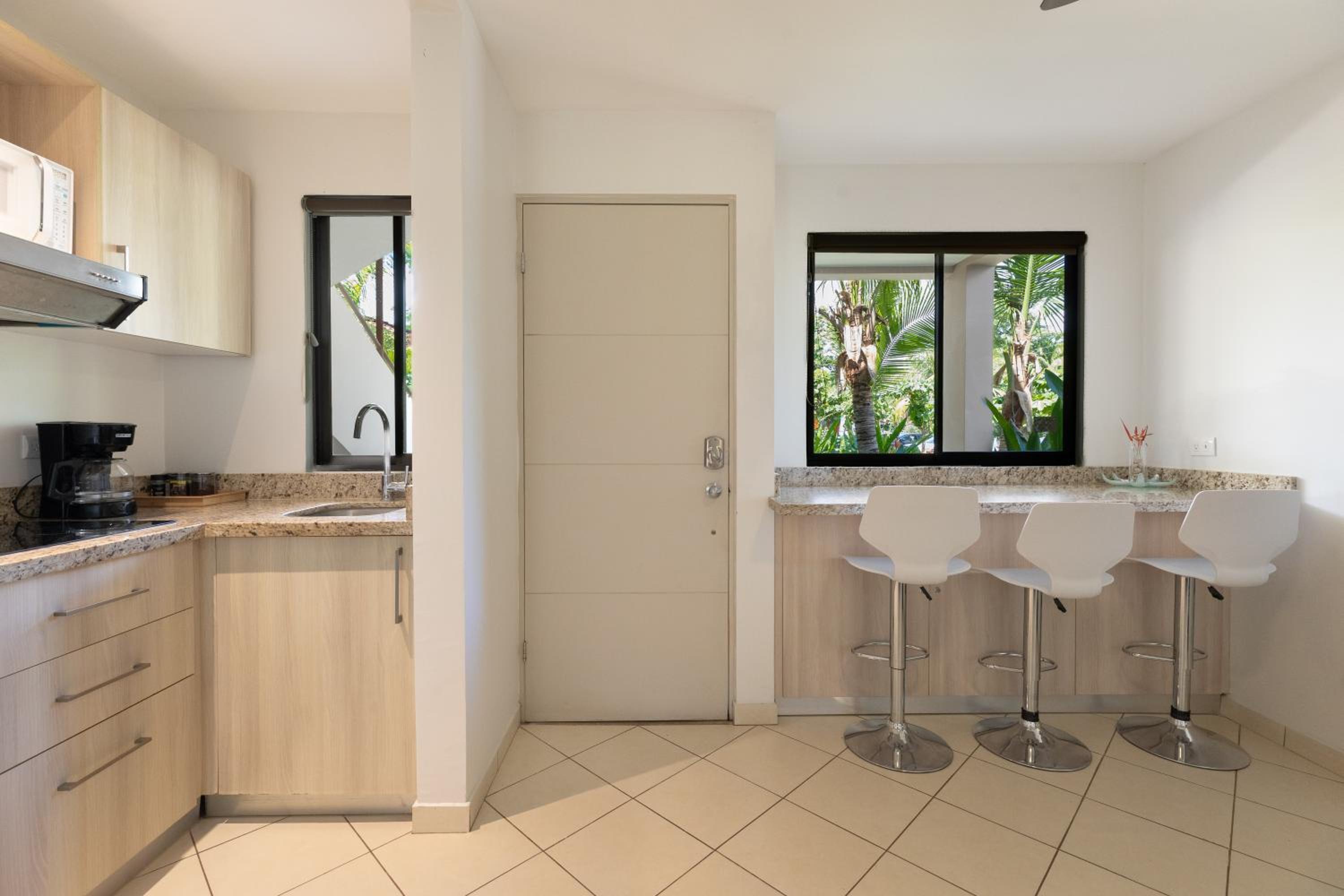 Two Palms Ground Floor Unit Across from Beach