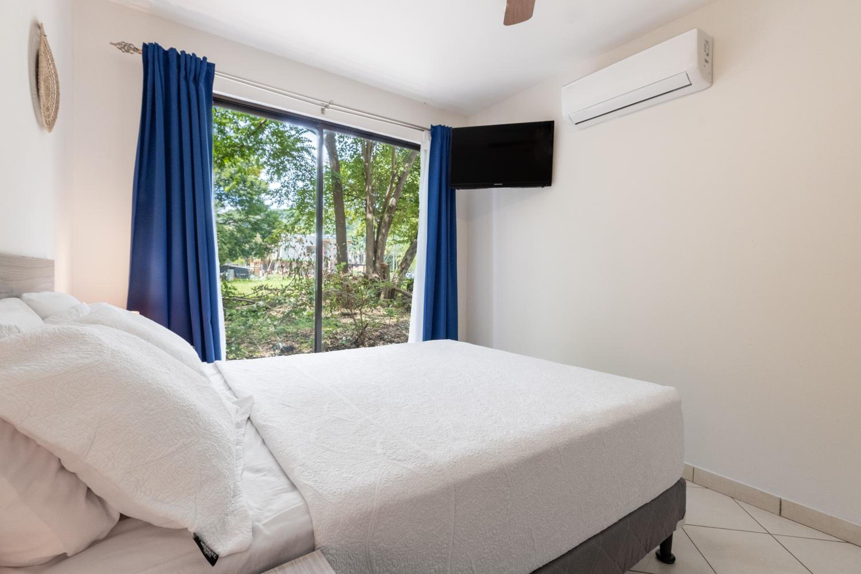 Two Palms Ground Floor Unit Across from Beach
