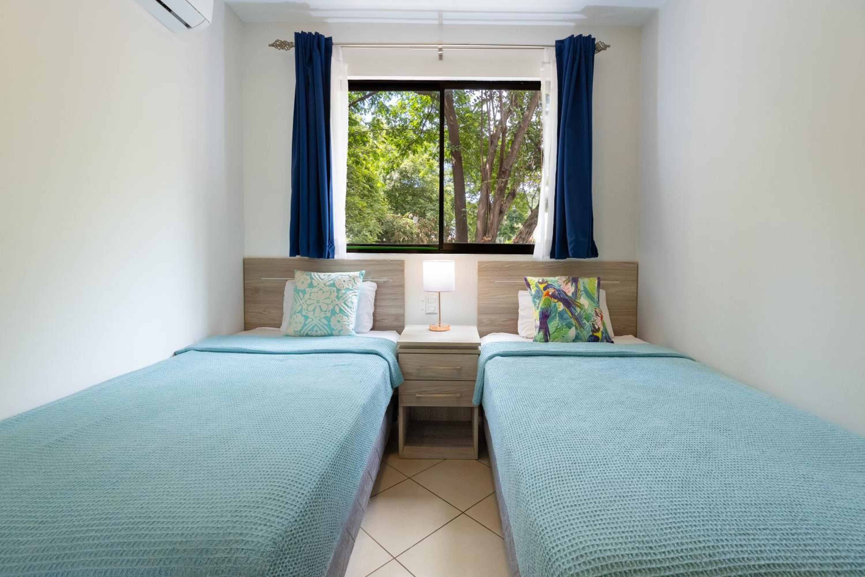 Two Palms Ground Floor Unit Across from Beach