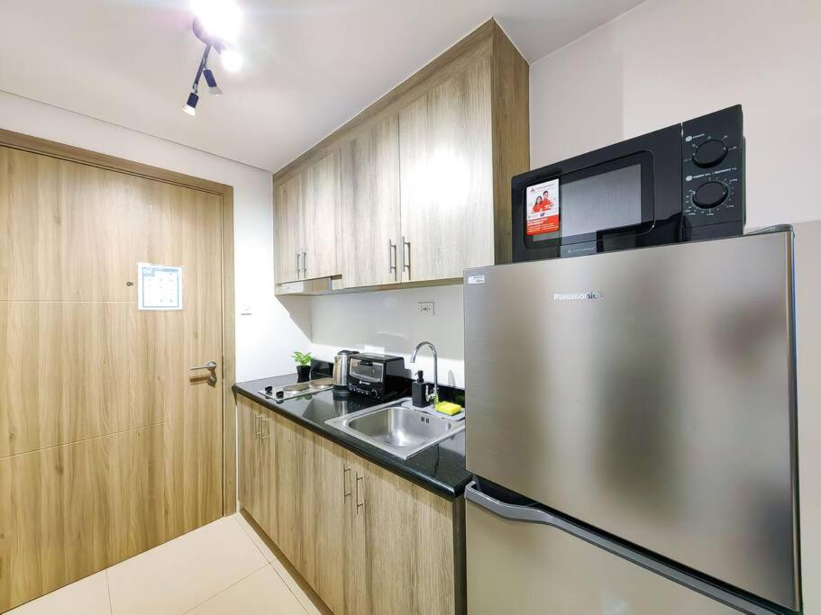 1BR Condotel with Balcony at FAME Residences #FM03 view 4