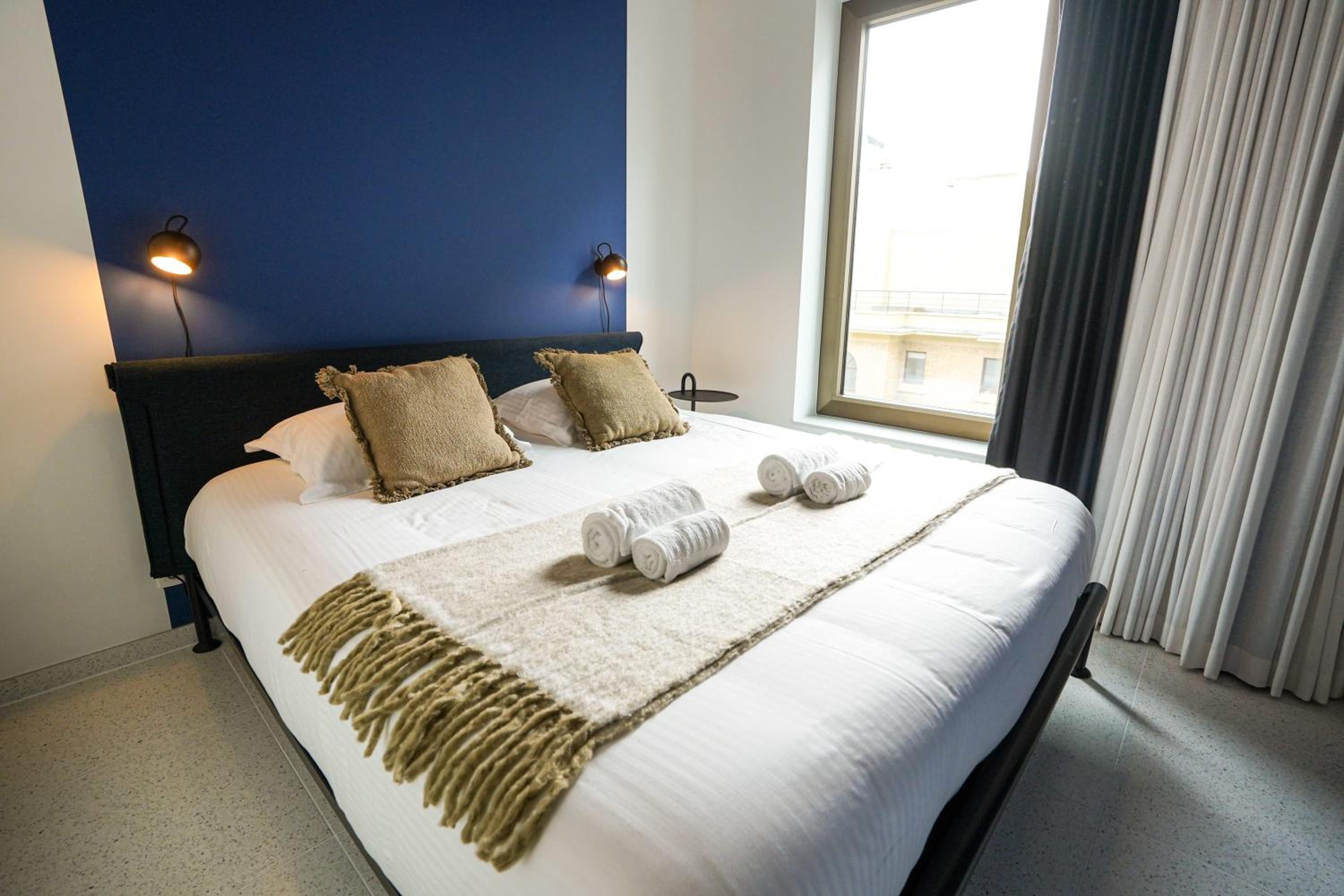 Huswell - Modern one bedroom apartment with lateral sea view