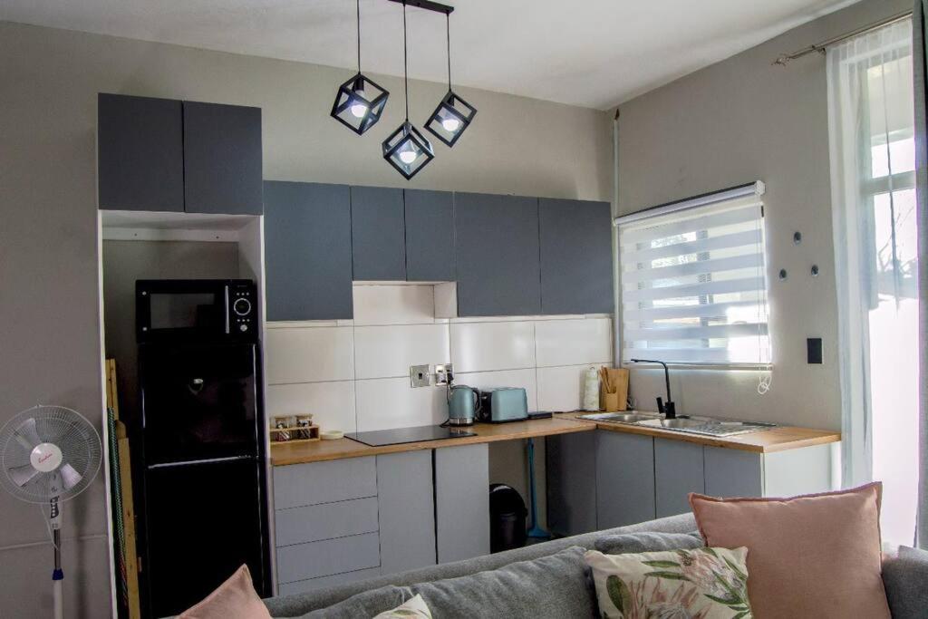 Cosy Nest 5 min2Sandton City 15
