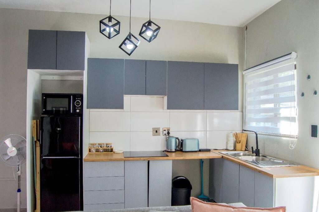 Cosy Nest 5 min2Sandton City 15