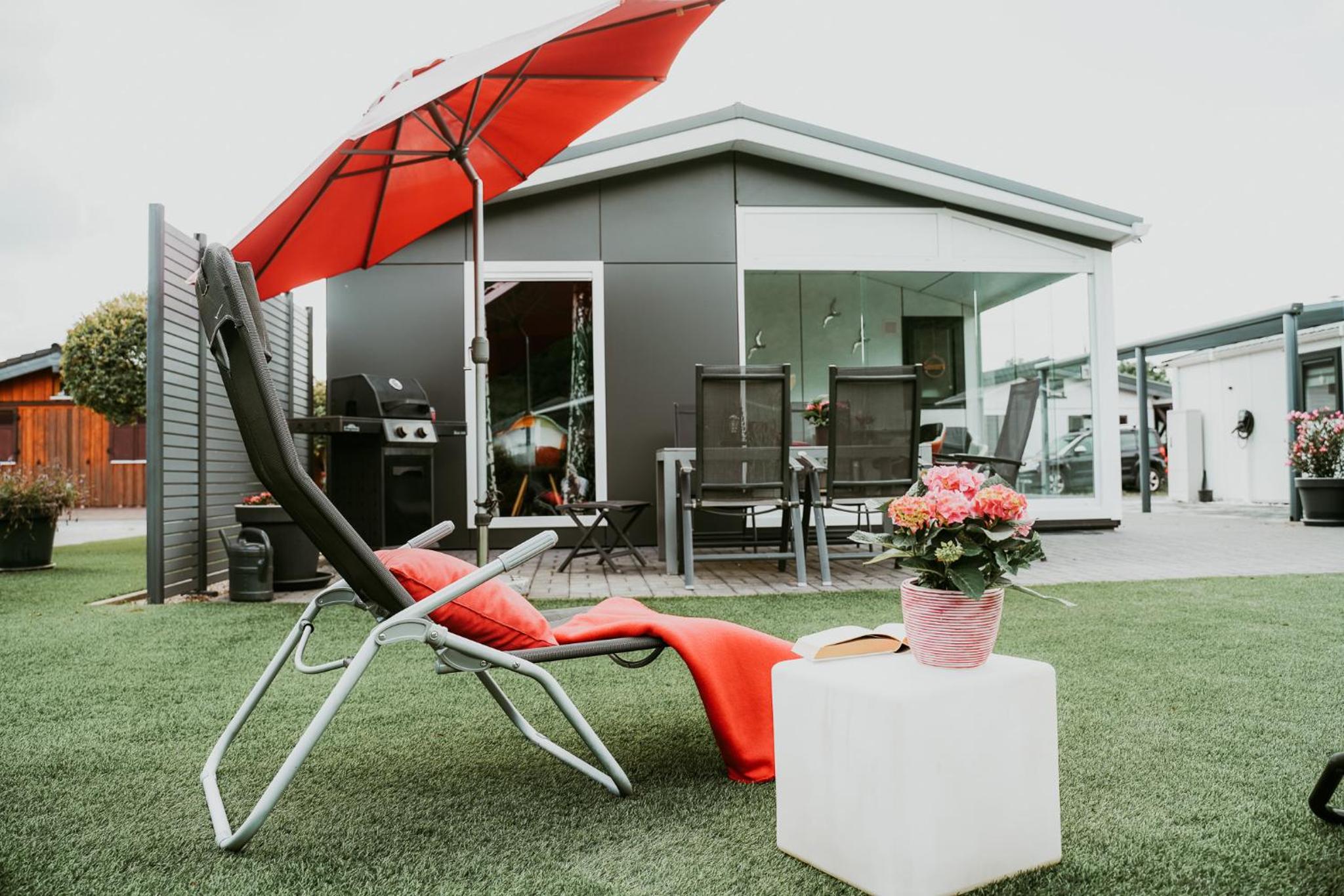 Ferienhaus Ufergeheimnis am Gülser Moselbogen I 2 SZ I 5 Gäste I Badebucht I Grill I Garten