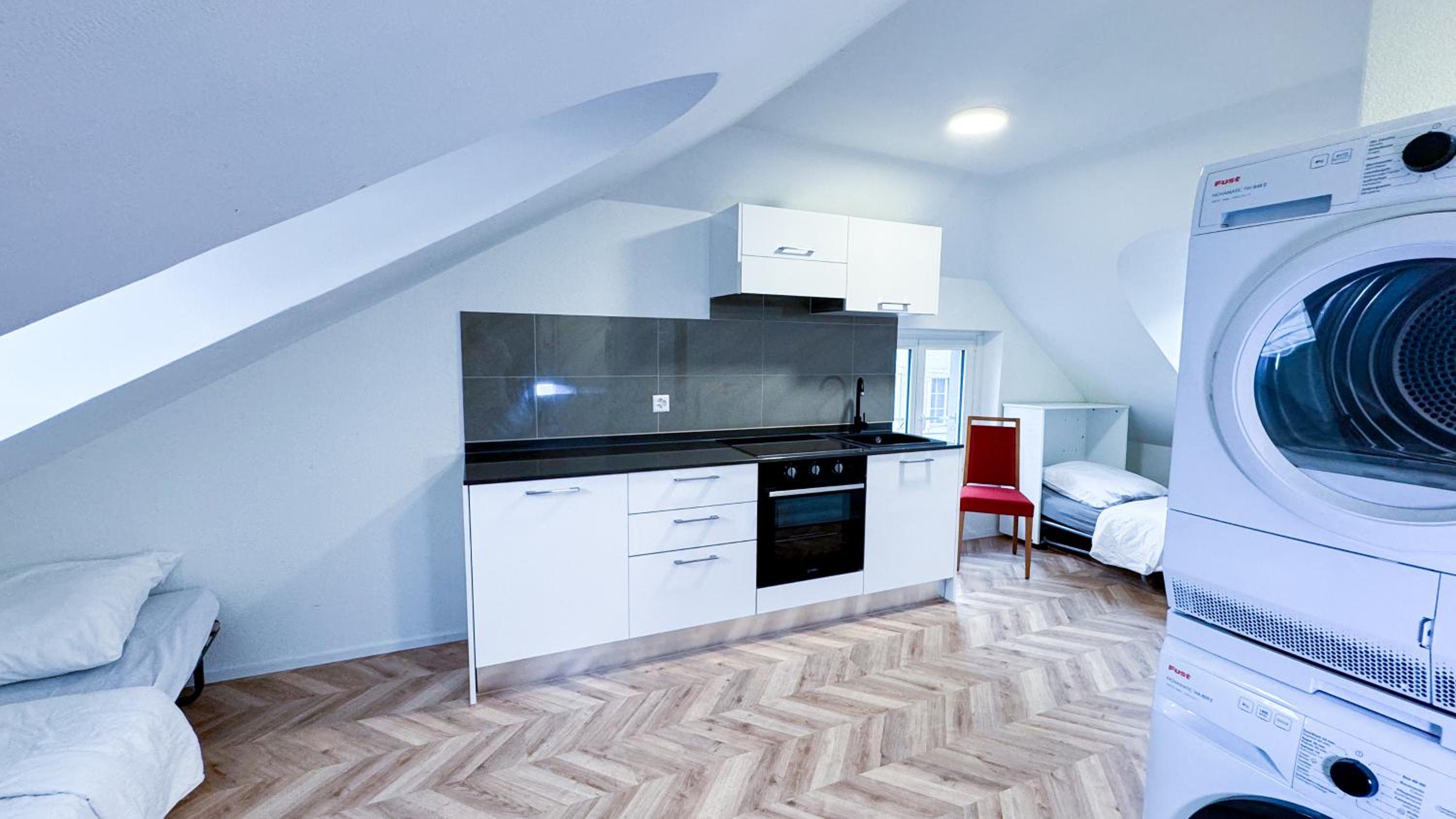 Gray apartment by freihofapartments