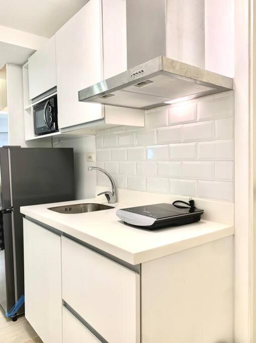 Blissful Bali Studio Azure North by THE BALI CORNER AT AZURE NORTH, High Floor, Beautiful View of Resort Amenities and Mt Arayat view 2