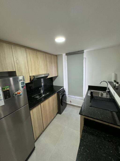 Apartamento cerca de todo