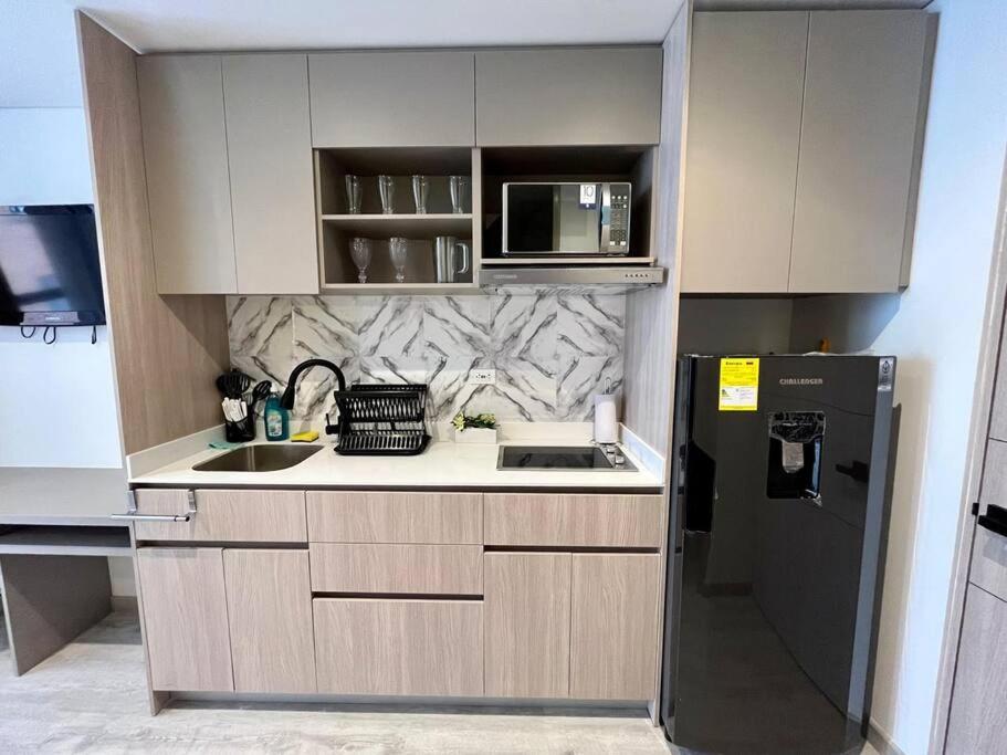 Hermoso Apartaestudio NUEVO cerca a embajada USA y Corferias