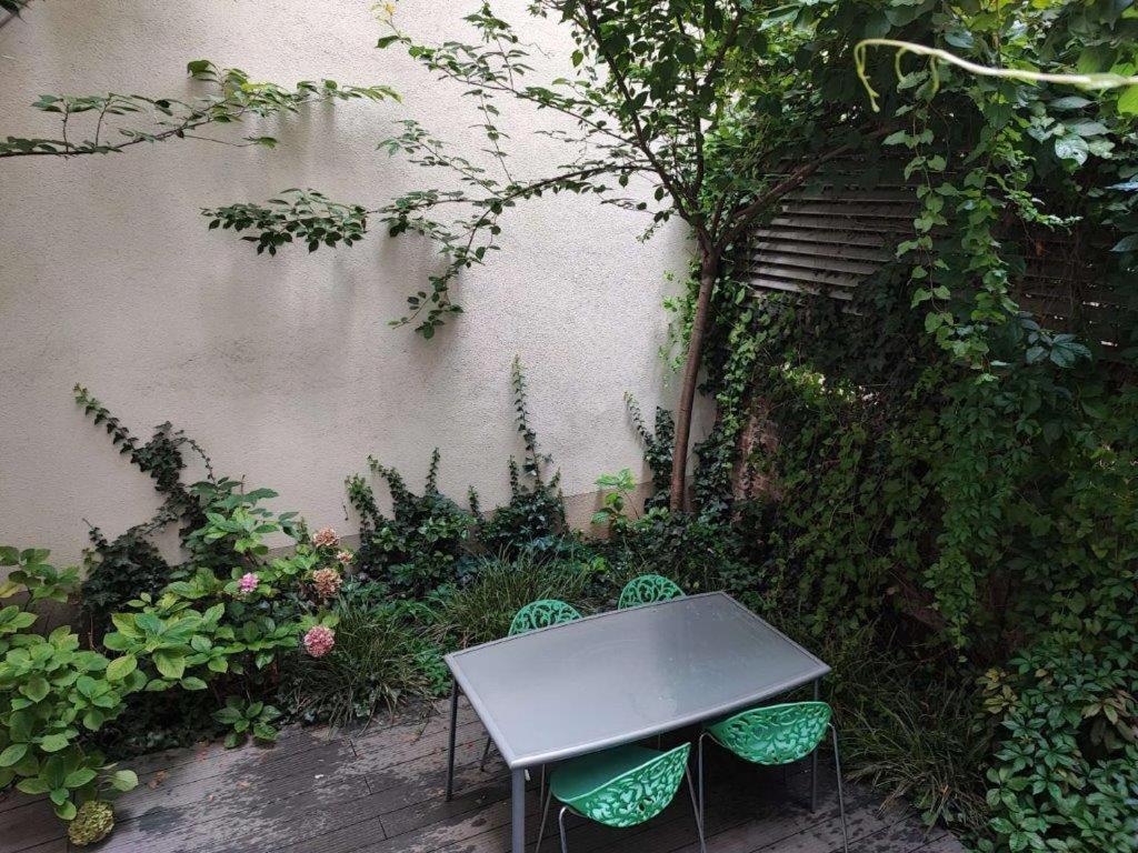 Central Vienna Apartment with unique 40m2 city garden & self check in