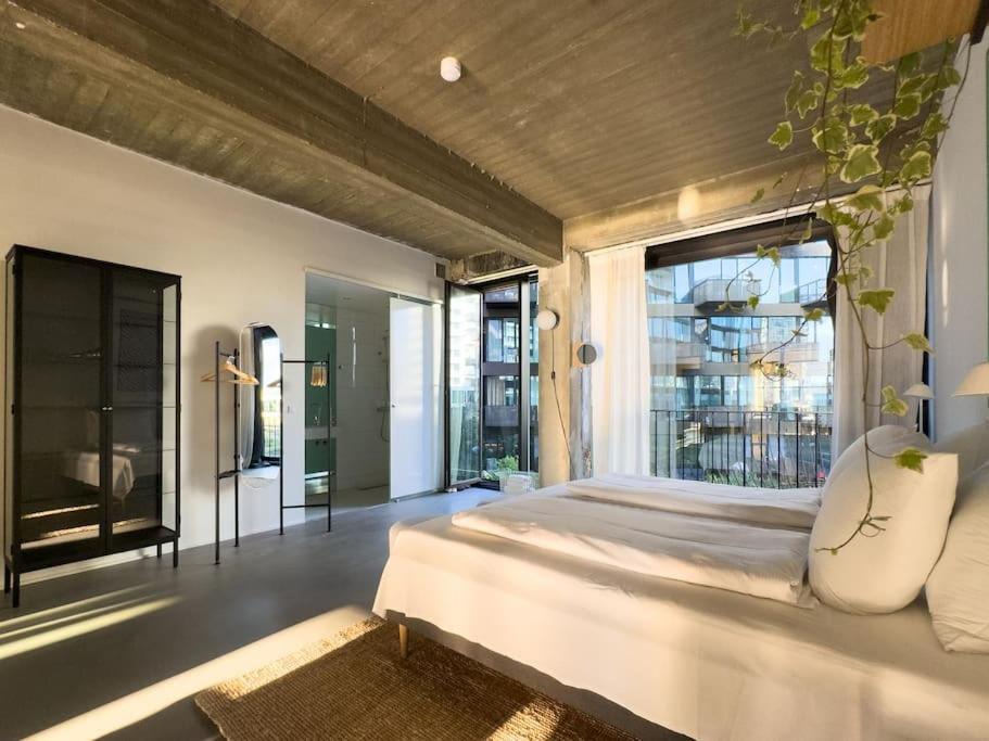 Stunning Industrial-Style Loft by the Canals