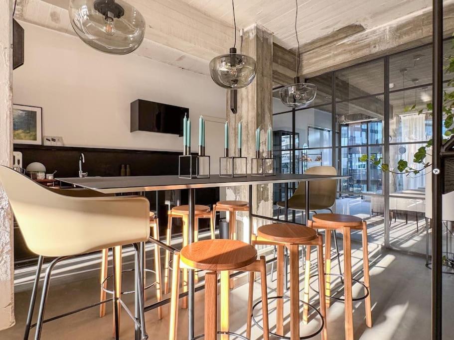 Stunning Industrial-Style Loft by the Canals