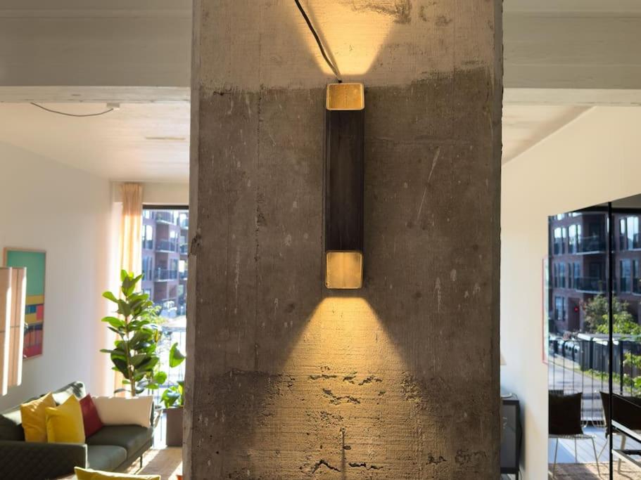 Stunning Industrial-Style Loft by the Canals