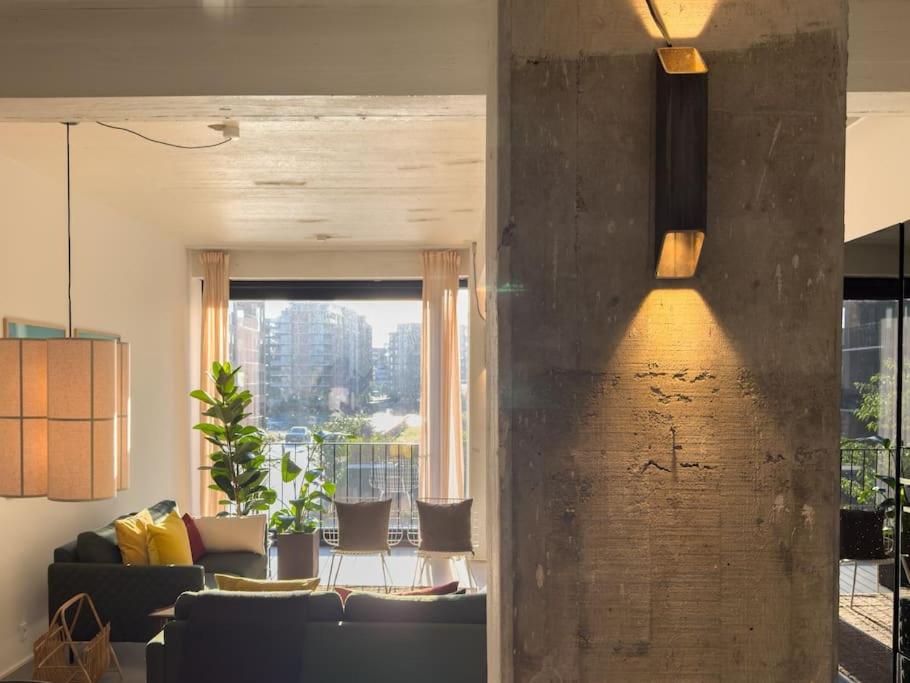 Stunning Industrial-Style Loft by the Canals