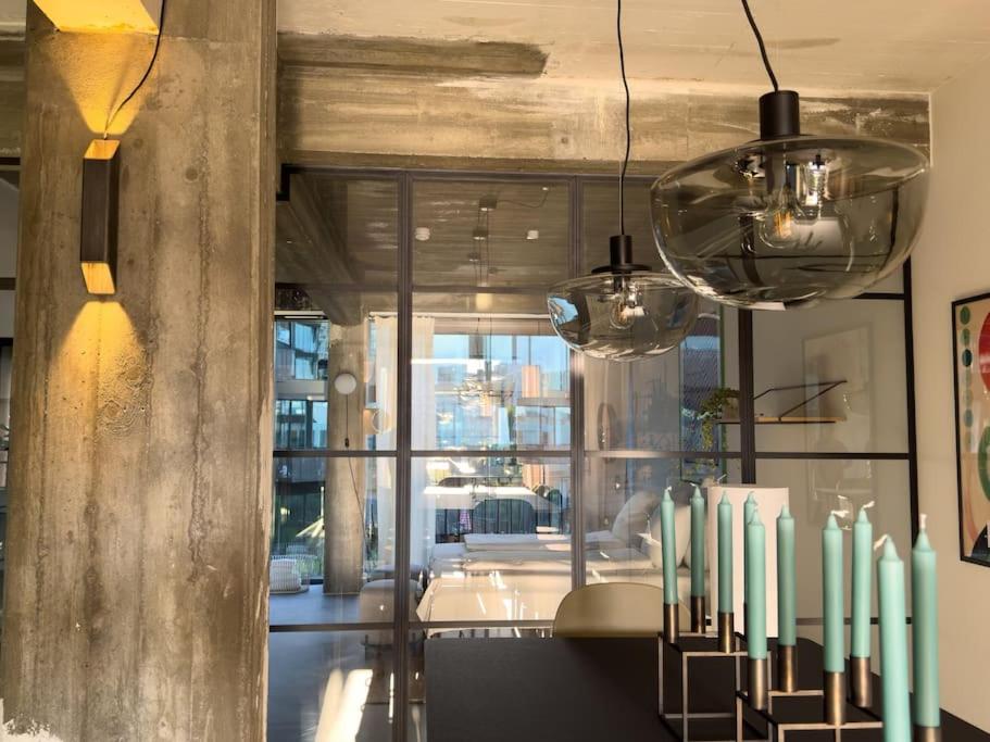 Stunning Industrial-Style Loft by the Canals