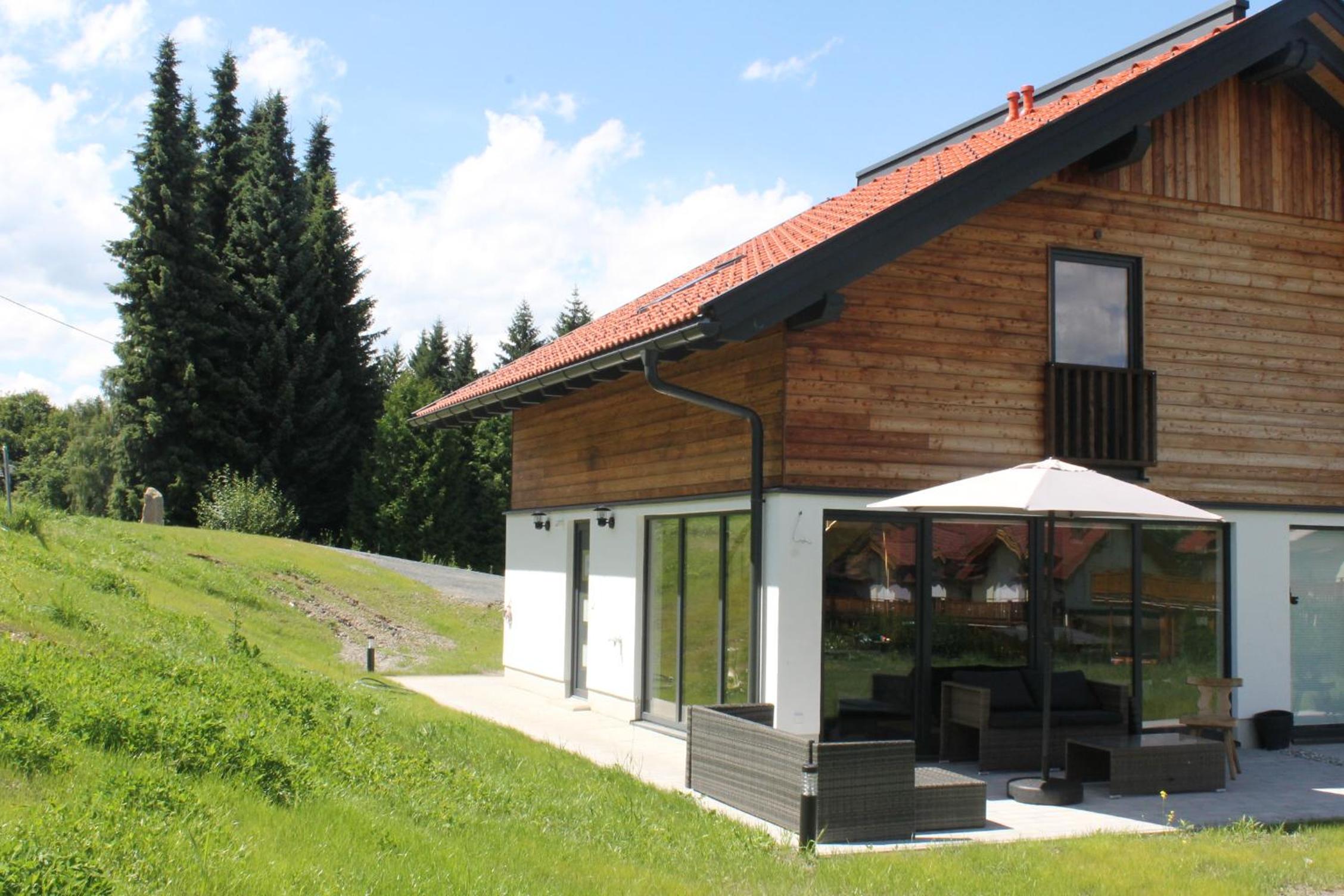 Huis 3landenpunt AT-SLO-IT bij de piste