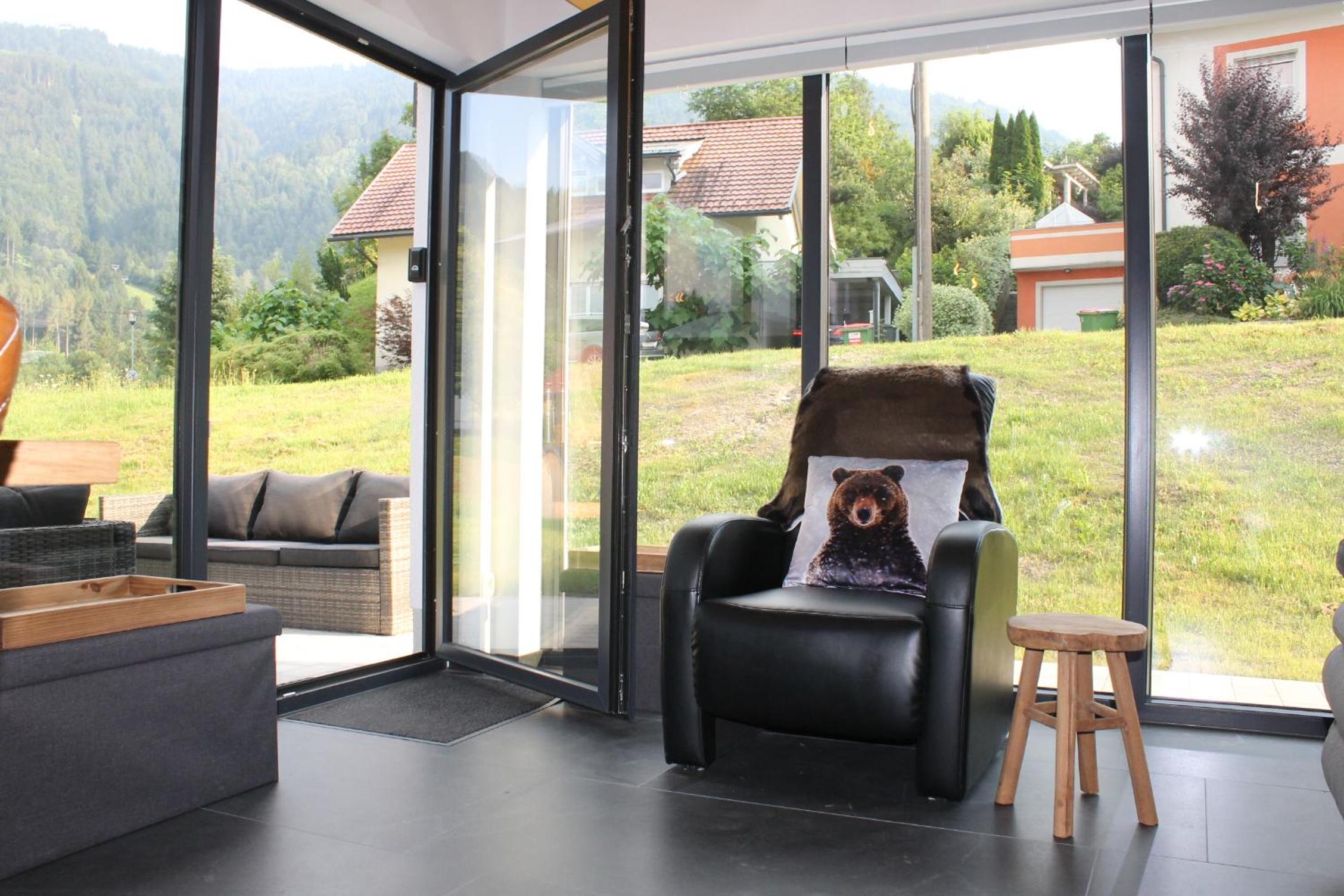 Huis 3landenpunt AT-SLO-IT bij de piste
