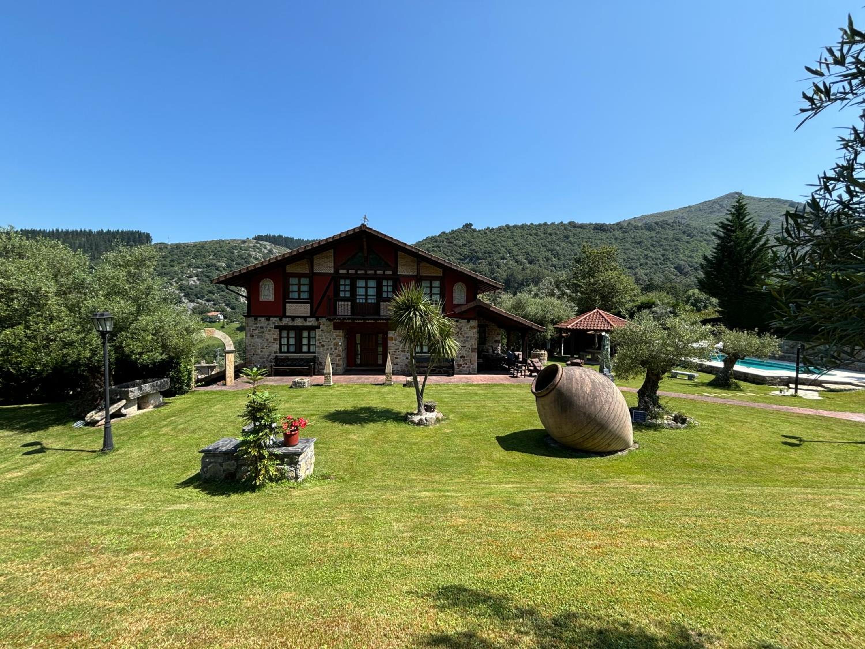 Vivienda turistica jardín con encanto y piscina