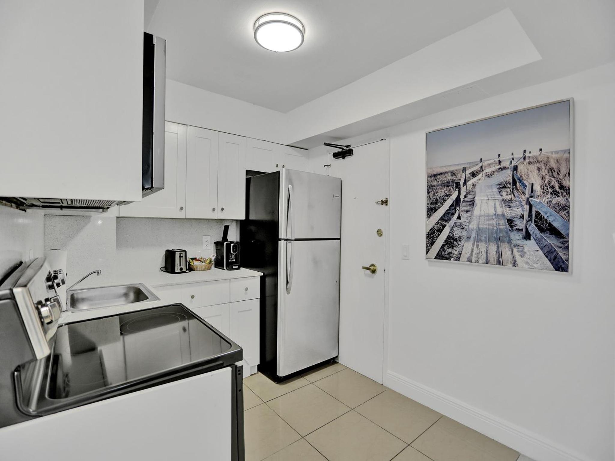 Oceanfront condo beach service 411 view 5