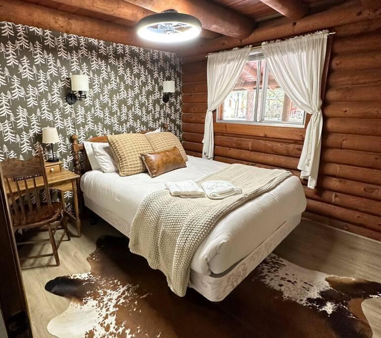 Charming Log Cabin in Tall Pines with Fire Pit Near Trails & Lake view 4