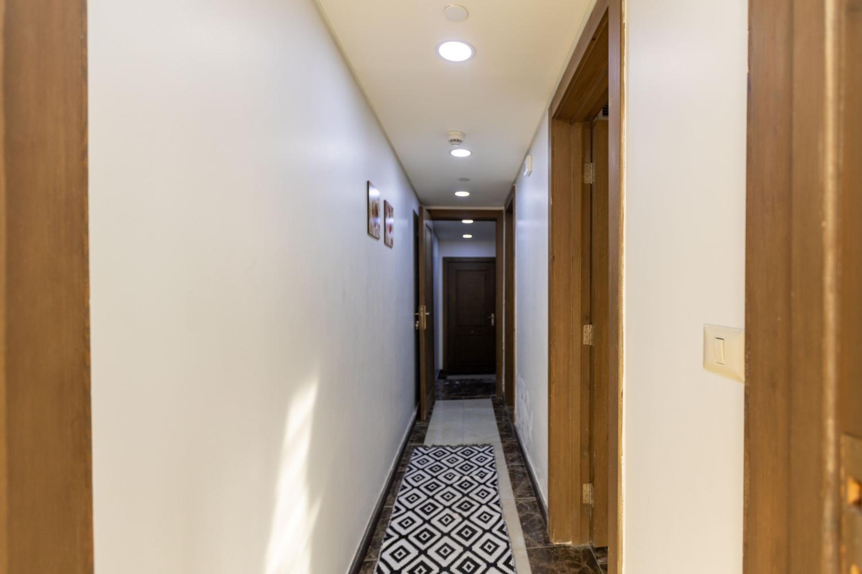 2 Bedroom Luxurious AUC Duplex with Private Balcony - Modern & Cozy