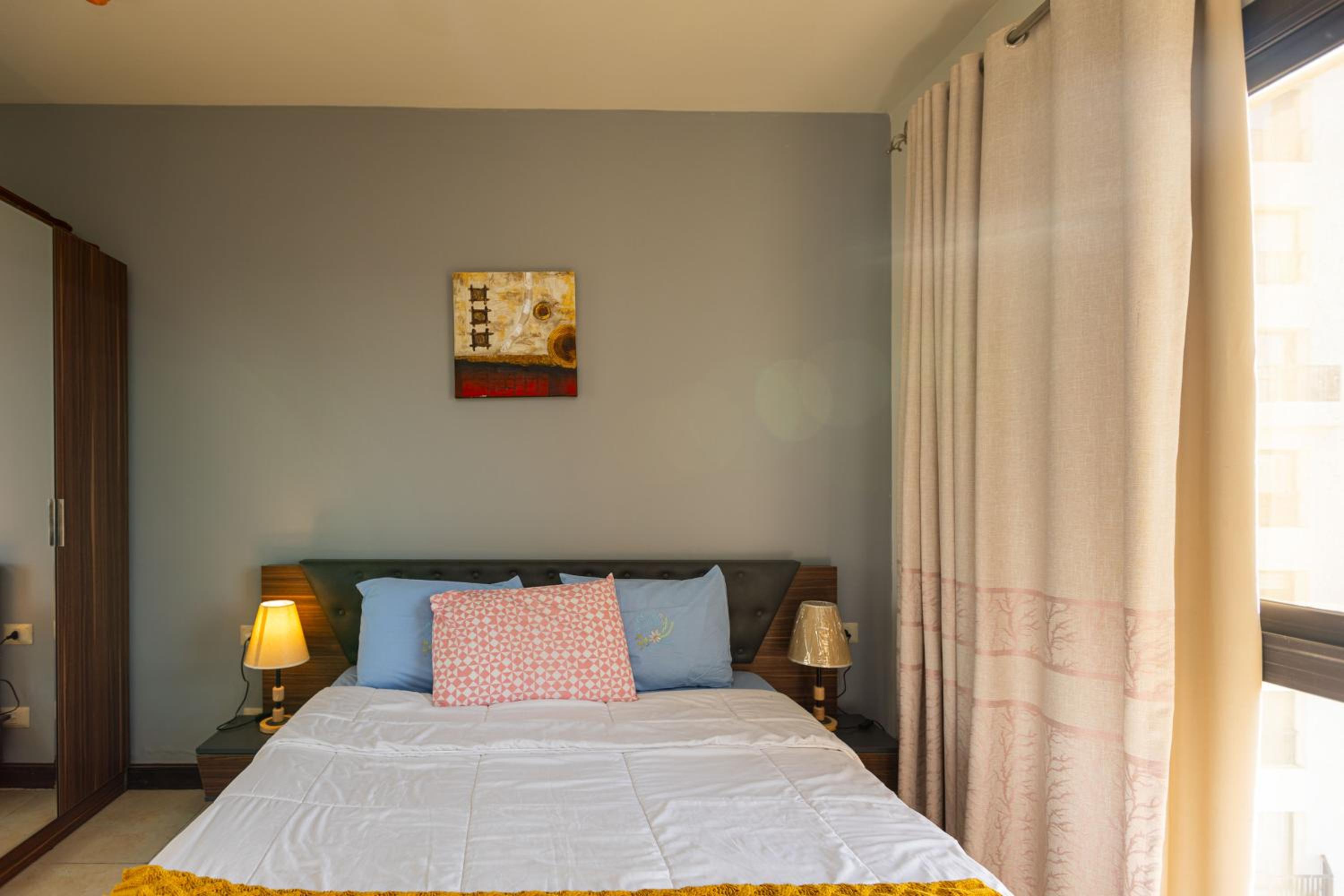 2 Bedroom Luxurious AUC Duplex with Private Balcony - Modern & Cozy