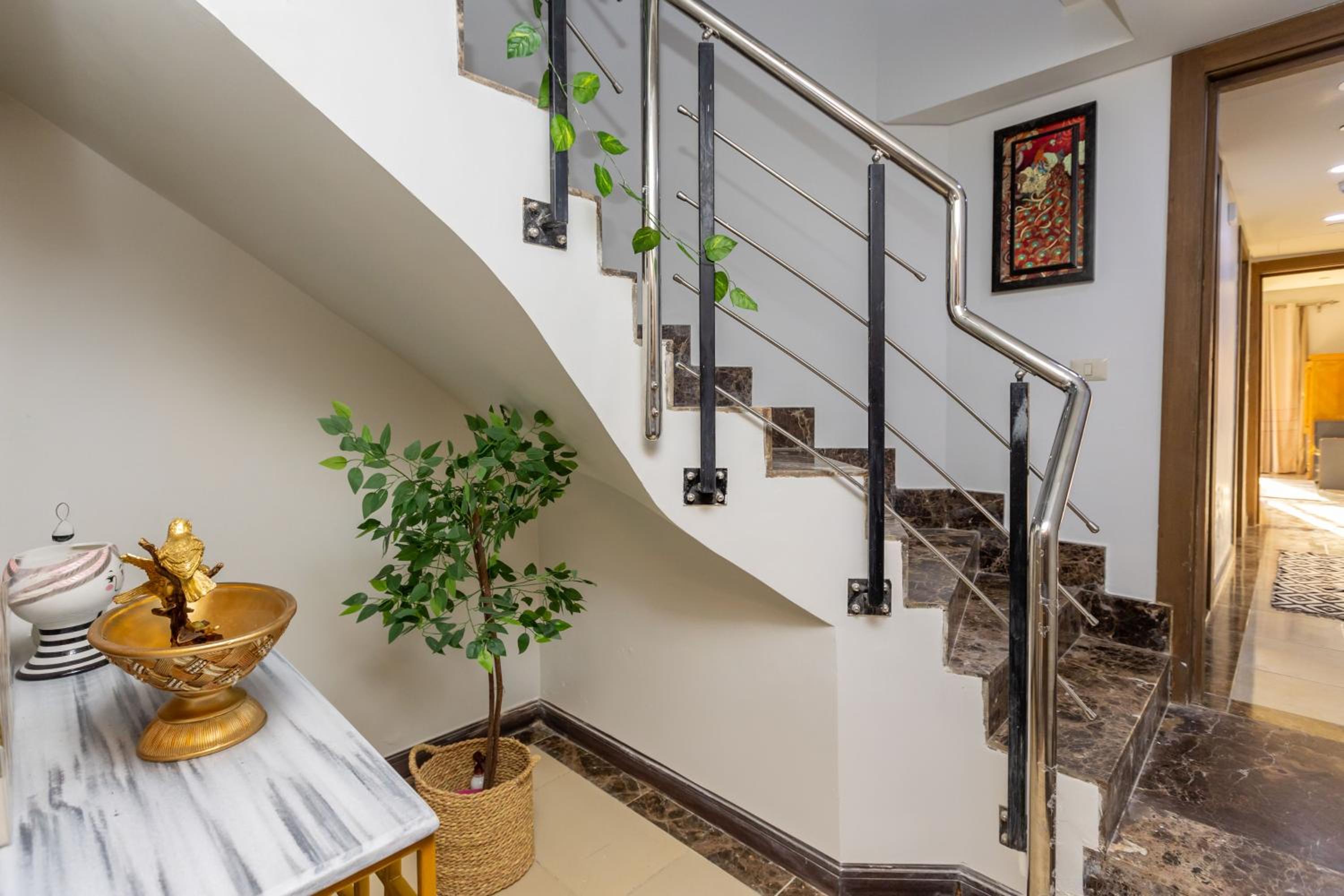2 Bedroom Luxurious AUC Duplex with Private Balcony - Modern & Cozy