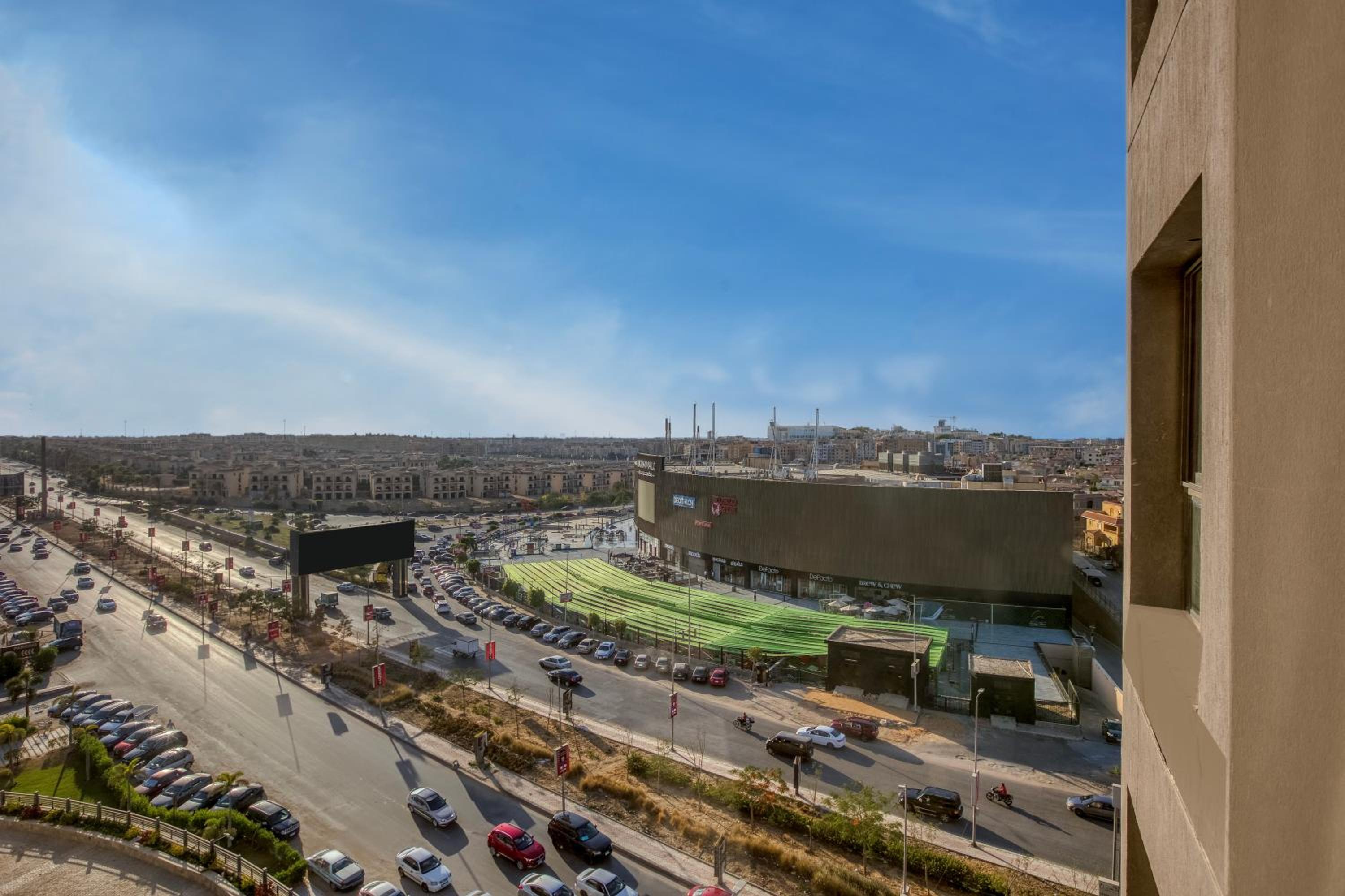 2 Bedroom Luxurious AUC Duplex with Private Balcony - Modern & Cozy