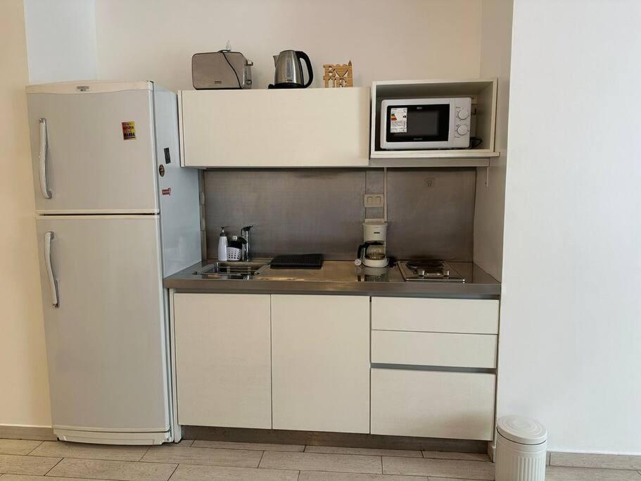 Studio de estilo con vista a plaza Vicente López