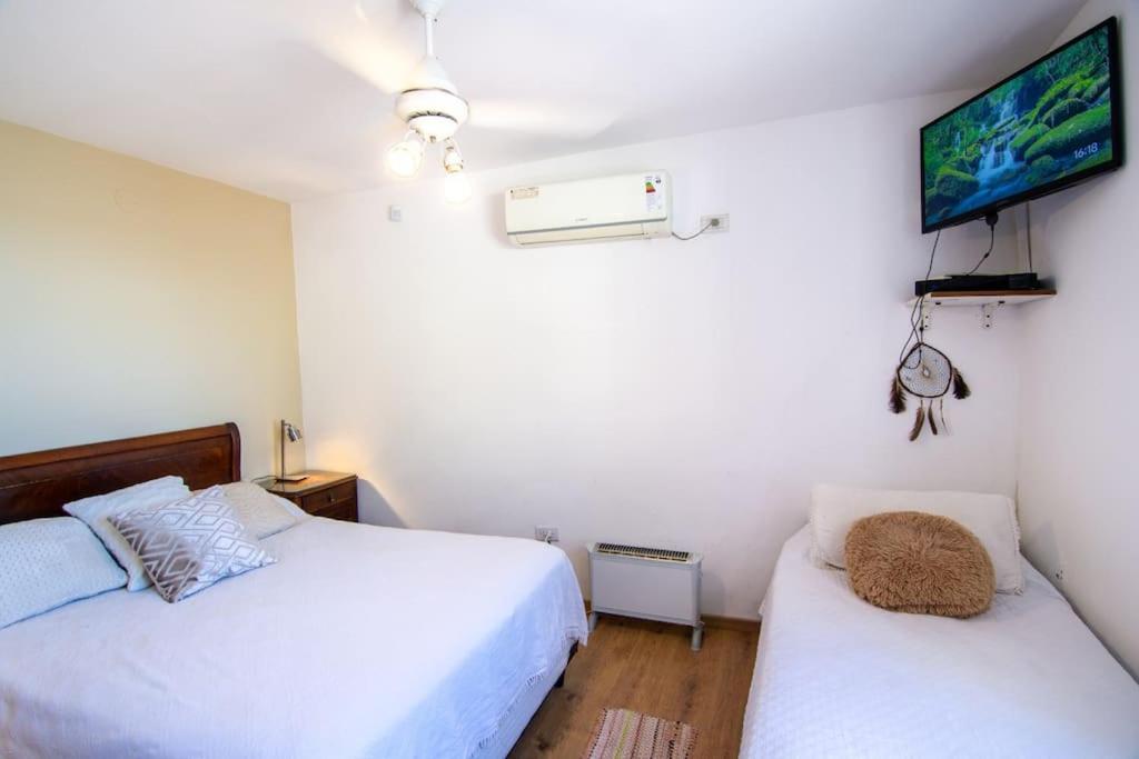 Hermosa casa, terraza al río, Jacuzzi climatizado