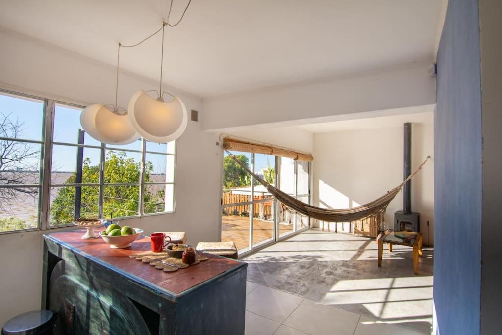 Hermosa casa, terraza al río, Jacuzzi climatizado