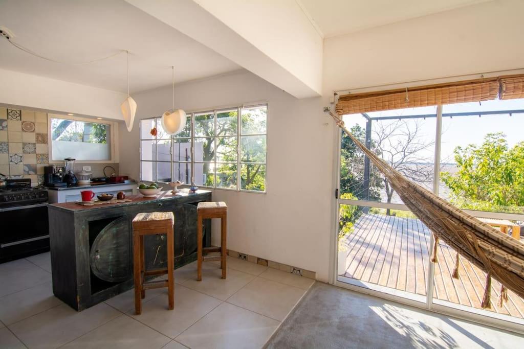 Hermosa casa, terraza al río, Jacuzzi climatizado