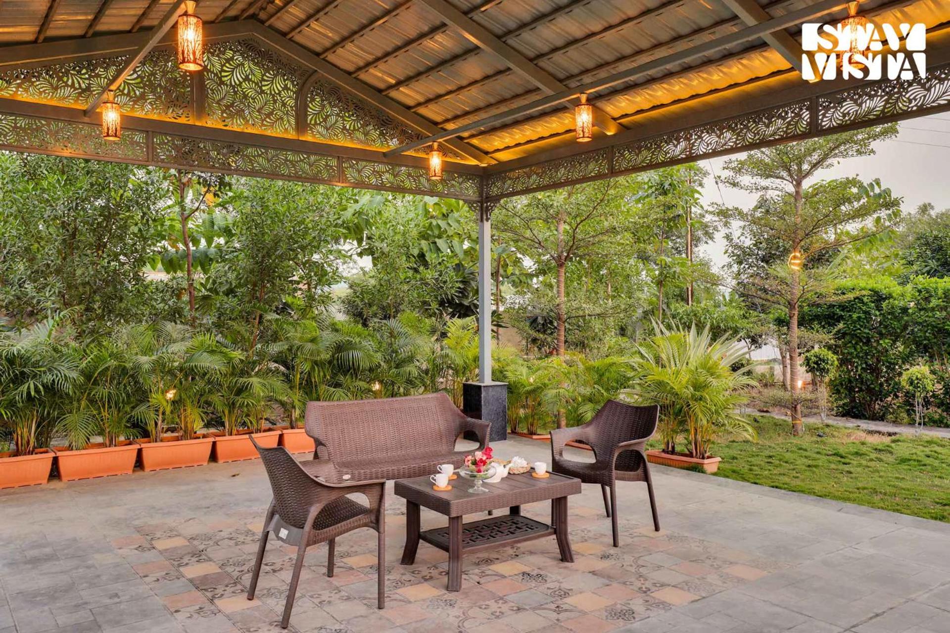 StayVista's Green Embrace - Villa in Bor Tiger Reserve with Swimming Pool, Rainshower, Terrace & Lawn view 2