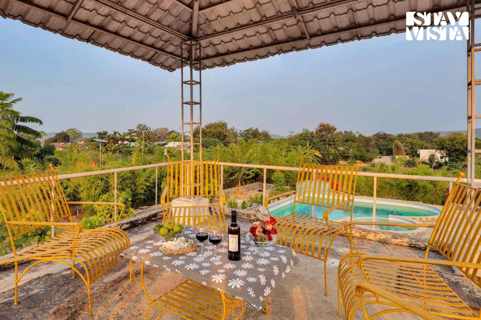StayVista's Green Embrace - Villa in Bor Tiger Reserve with Swimming Pool, Rainshower, Terrace & Lawn view 5