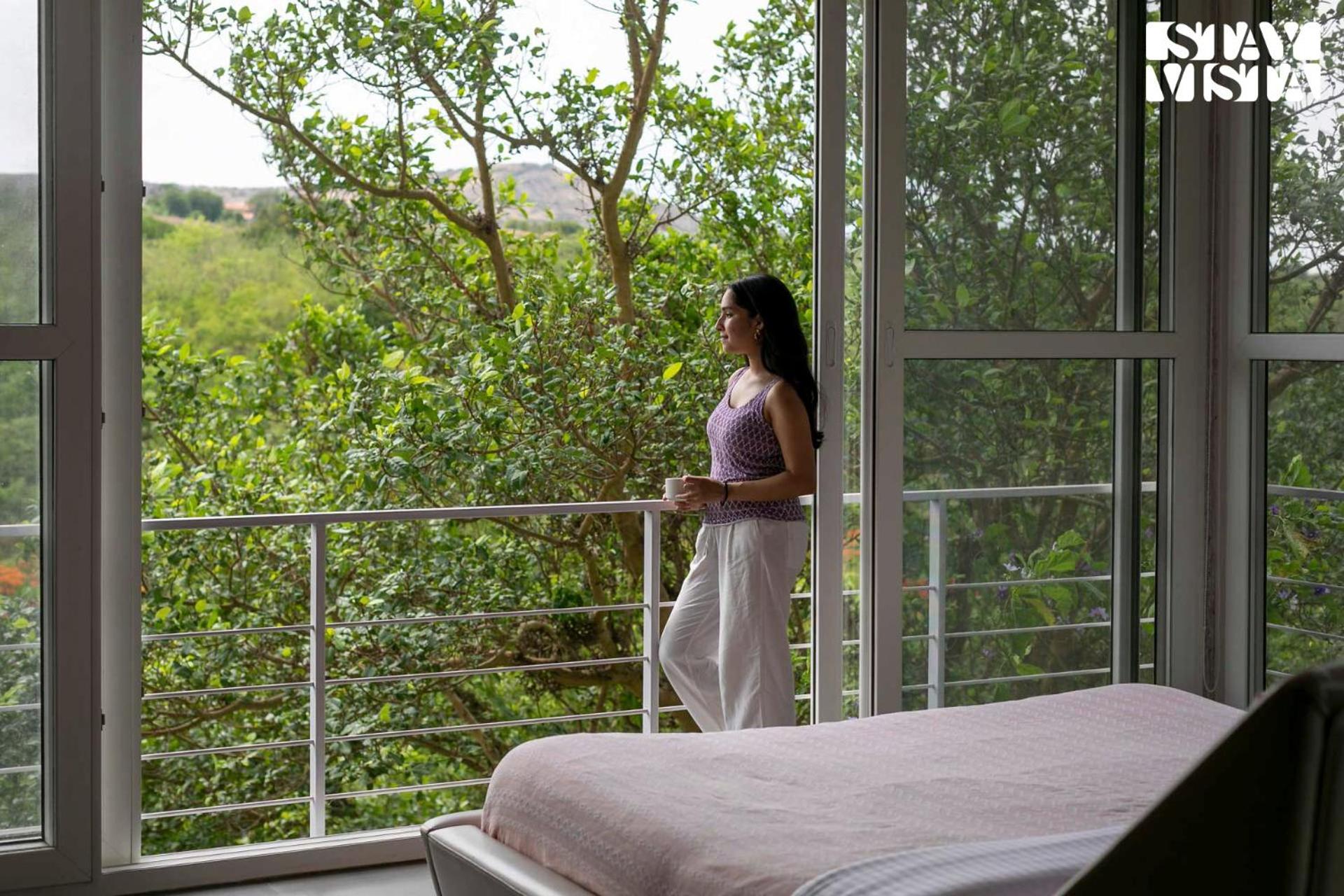 The Glasscape by StayVista - Hillside getaway with Pool and Indoor games view 5