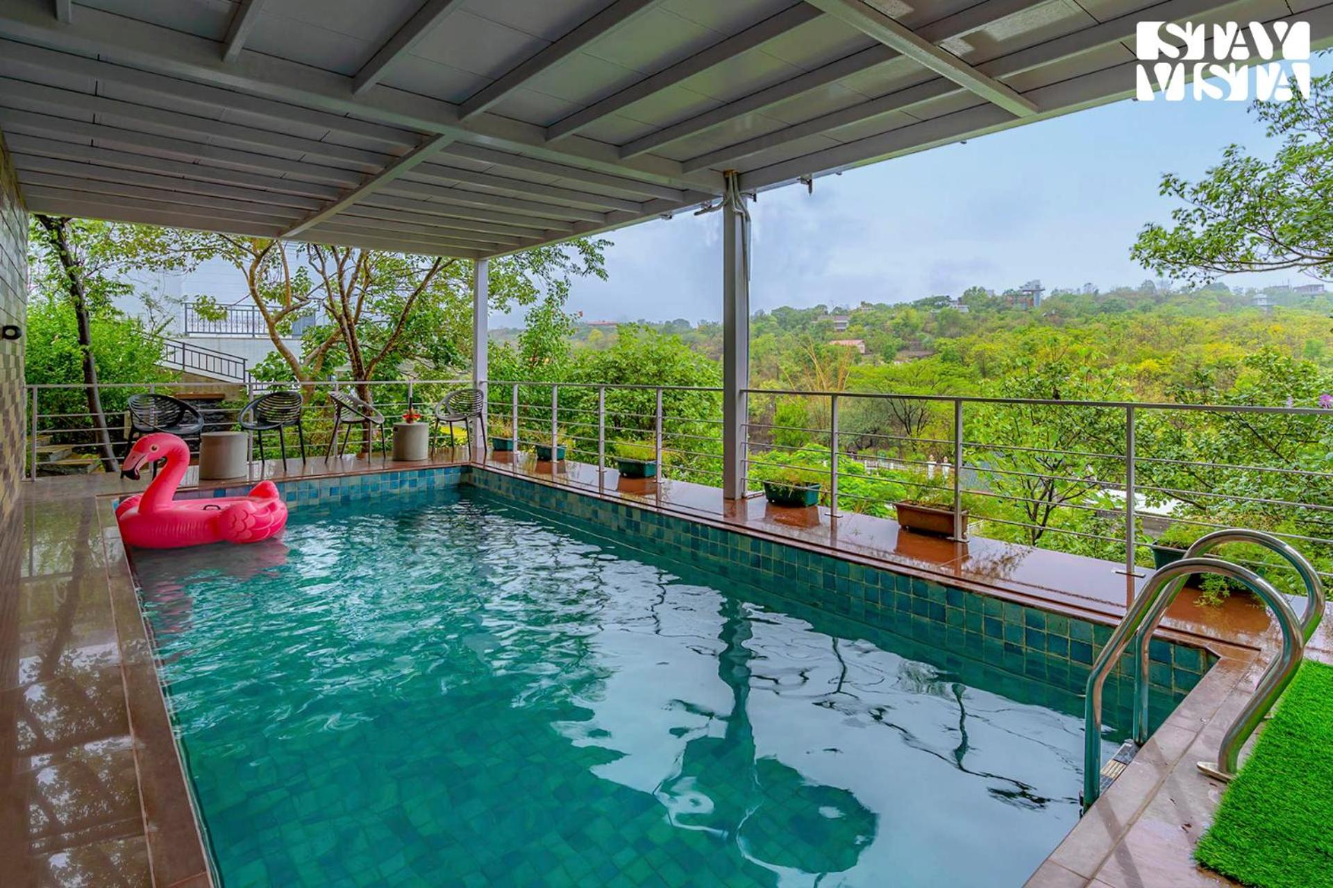 The Glasscape by StayVista - Hillside getaway with Pool and Indoor games view 3