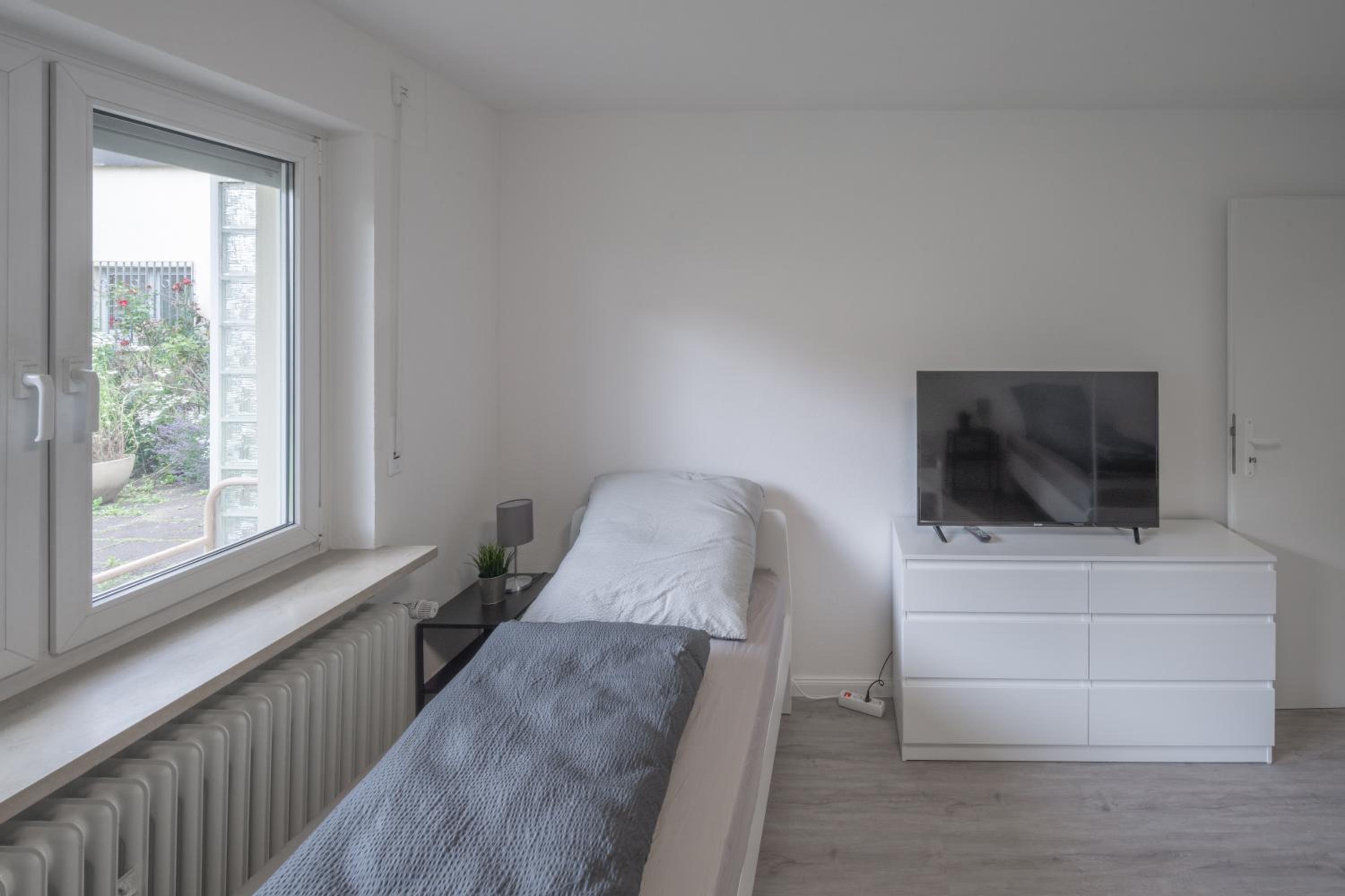 WORK&SLEEP Moderne Apartments in Villingen Schwenningen - Einzelbetten, TV, Bettwäsche & Handtücher, WLAN