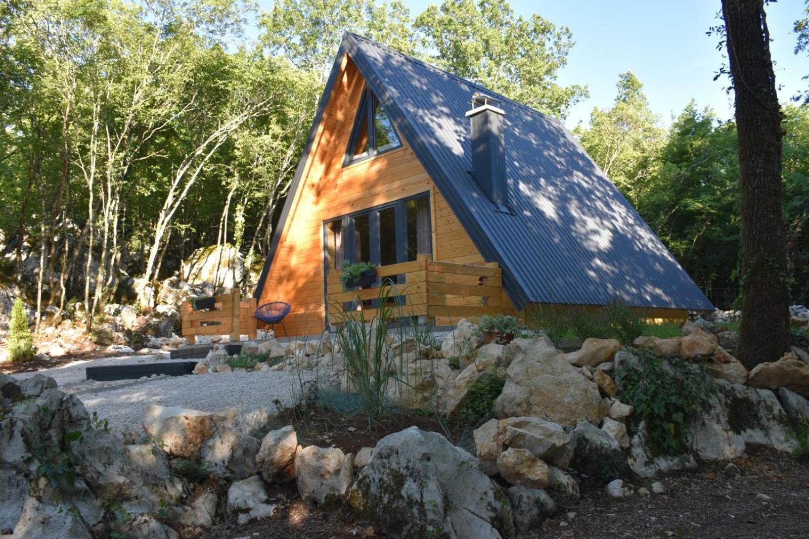 Woodland paradise Charming wooden houses in stone