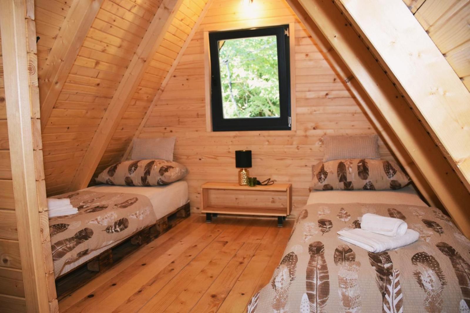 Woodland paradise Charming wooden houses in stone