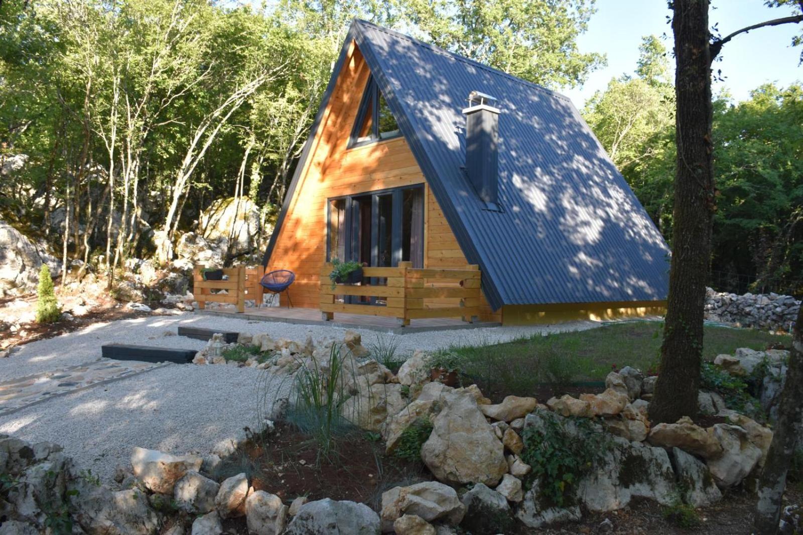 Woodland paradise Charming wooden houses in stone
