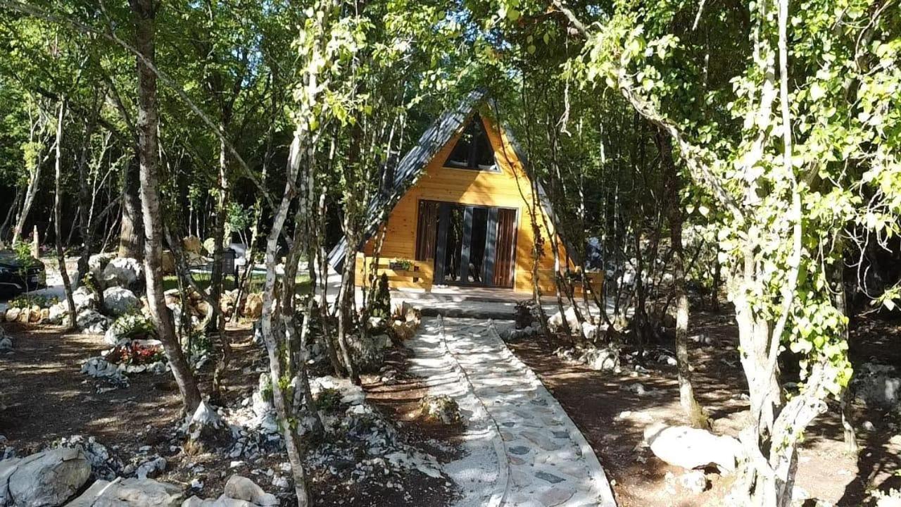 Woodland paradise Charming wooden houses in stone