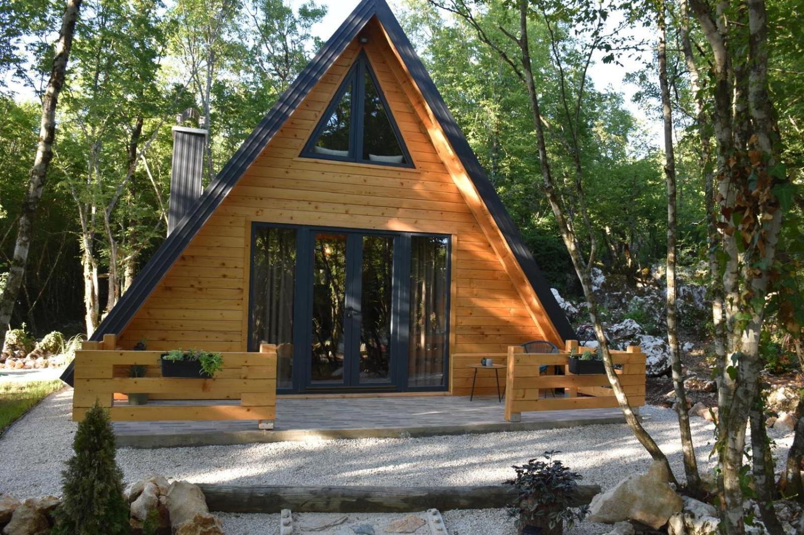 Woodland paradise Charming wooden houses in stone