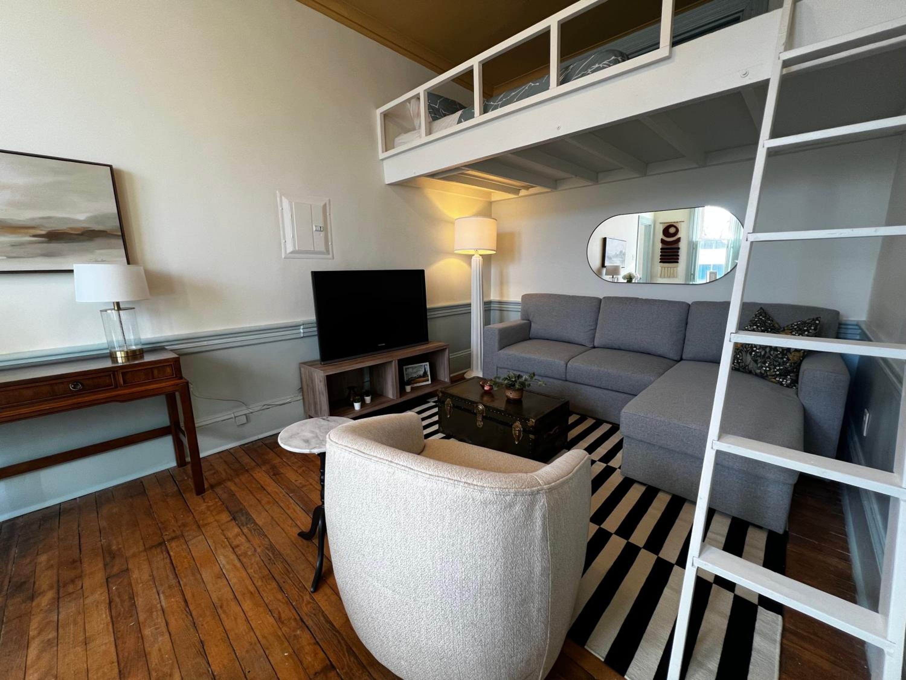 Modern Comforts in Downtown's Victorian Gem Patio, Unit #3