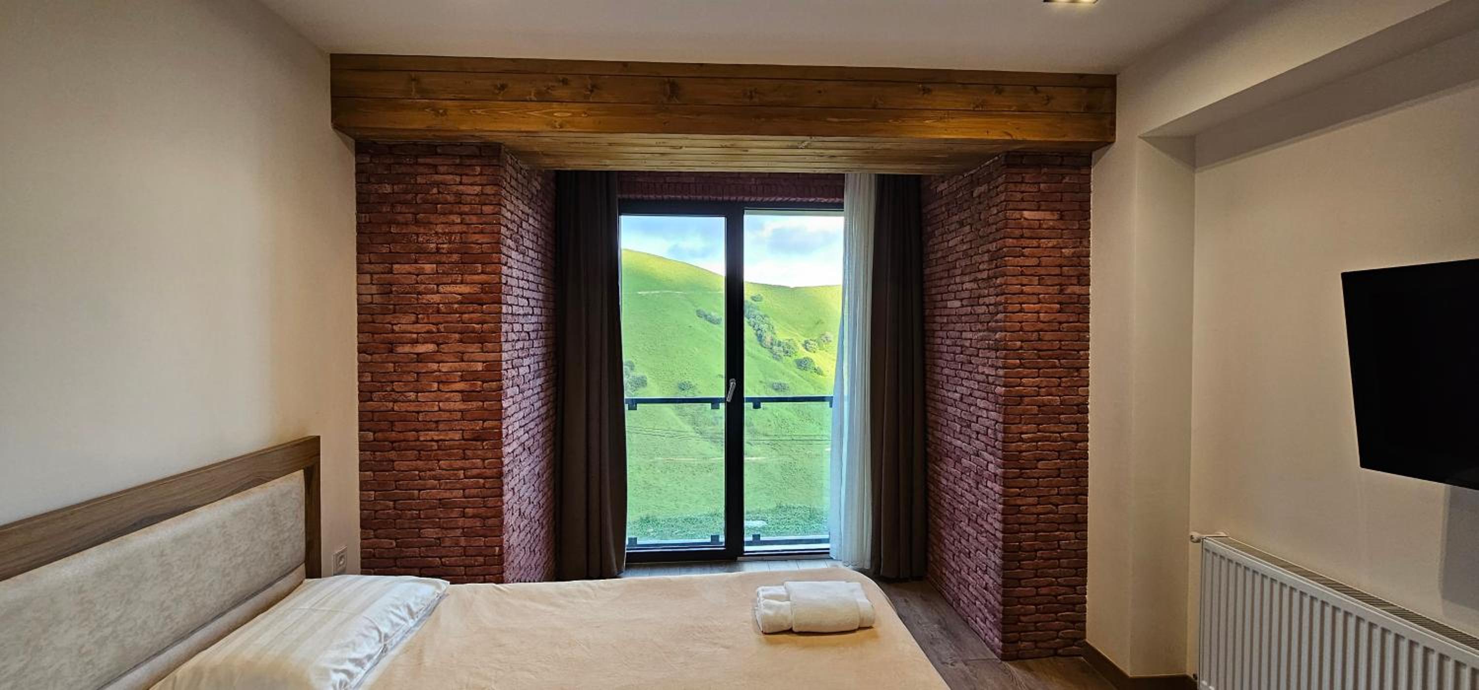 Evdo Apartments F4 wooden cozy studio view 3